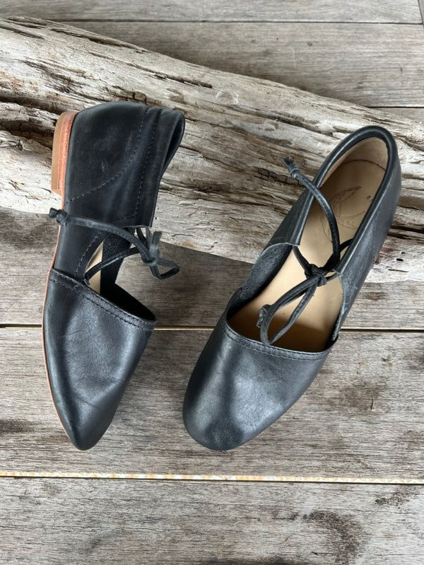 Black color soft leather flats with leather tie. size 7