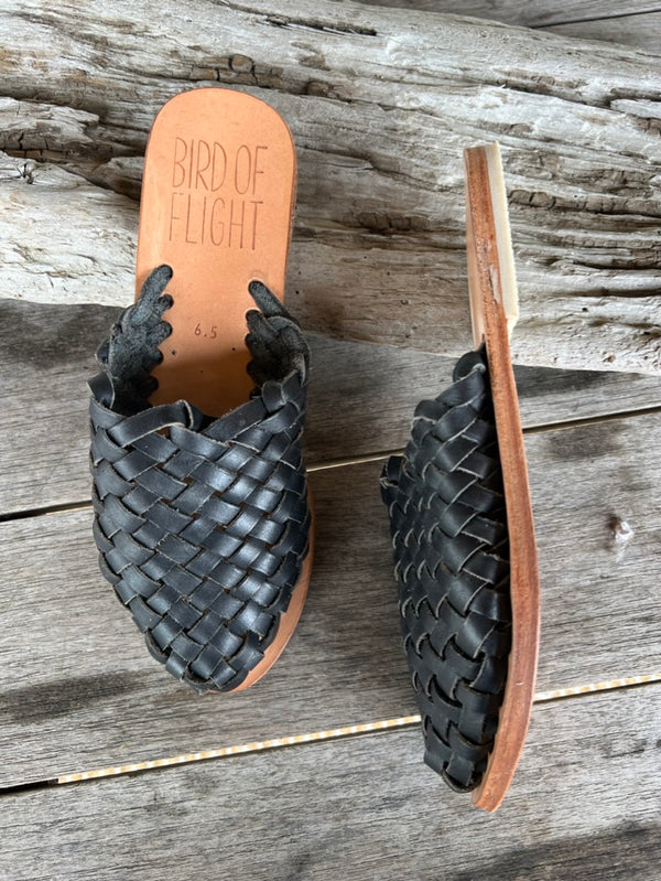 black woven leather mules.  Size 6- 6.5